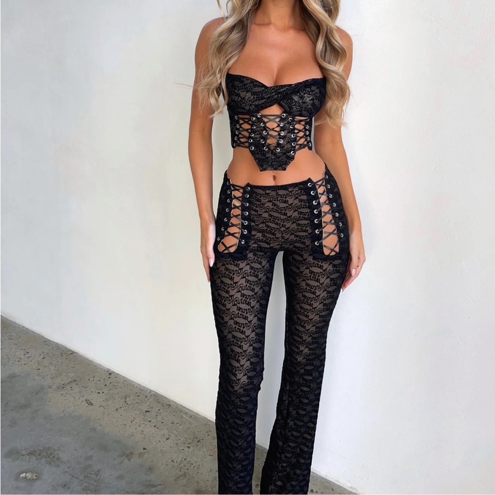 Outcast clothing set: pants & top. Never worn & tags are on.